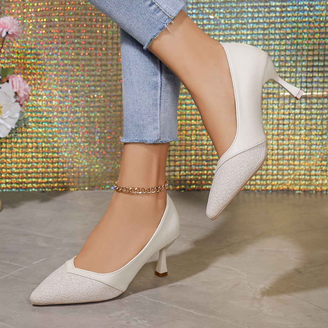 Women's pointed pumps with structured toe cap, curved stiletto heel, and cushioned comfort insole Mune Fashion