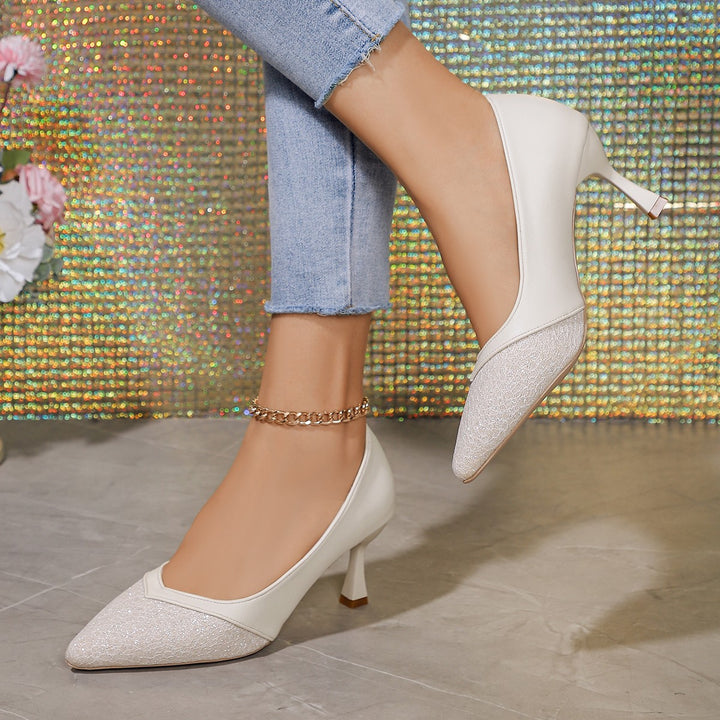 Women's pointed pumps with structured toe cap, curved stiletto heel, and cushioned comfort insole Mune Fashion