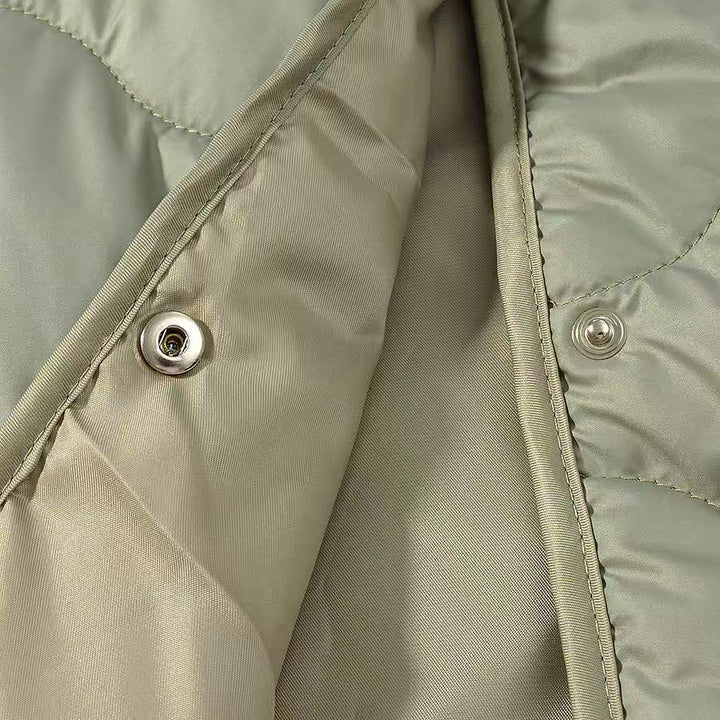 Women's Oversize Quilted Jacket without Collar with Snap Button Closure and Rounded Hem Mune Fashion
