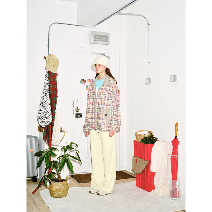 Women's lightly padded checkered boxy bomber jacket with drawstring hem, wooden bead cord and patch pockets Mune Fashion