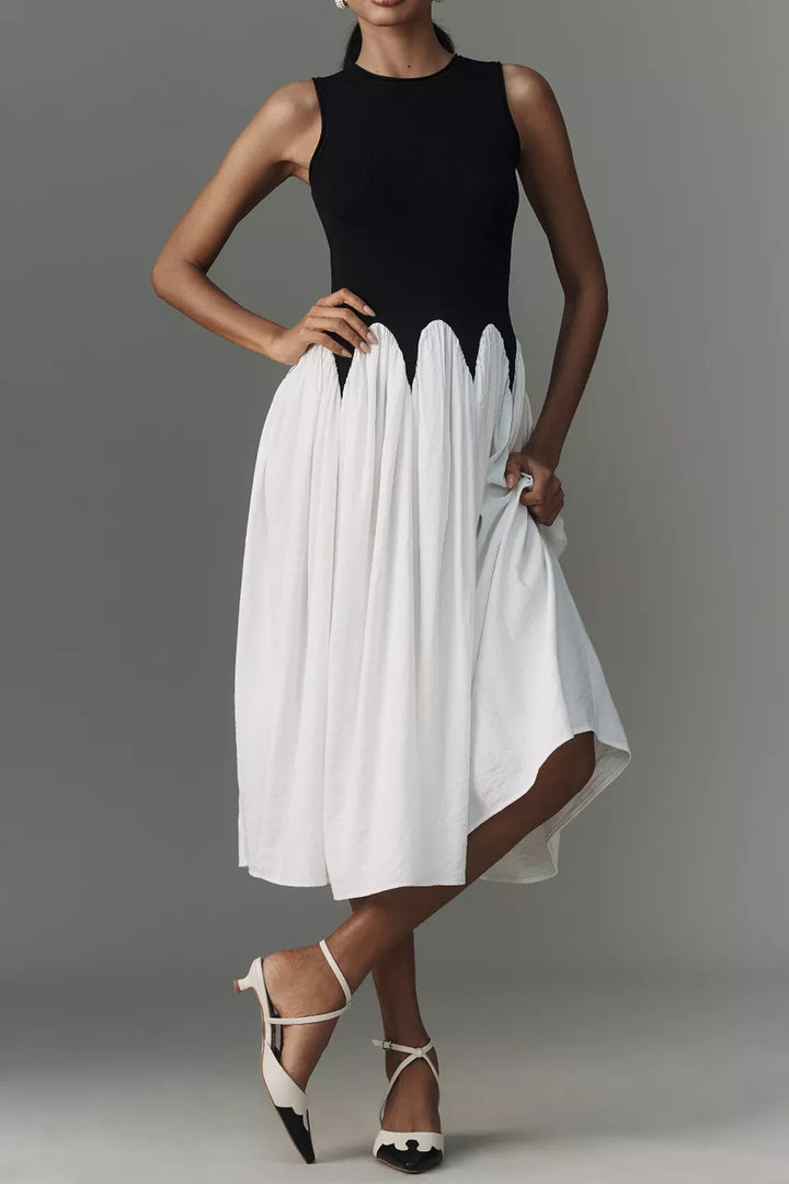 Women’s sleeveless midi dress with fitted ribbed top and flowing tiered skirt Mune Fashion