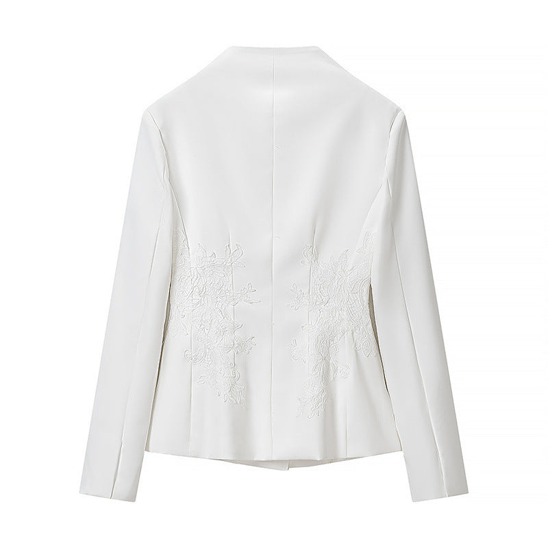 Women's tailored short blazer with standing collar and floral tone-on-tone embroidery Mune Fashion