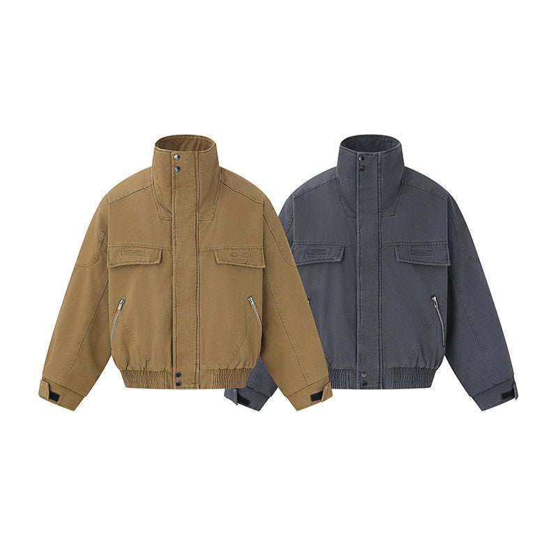 Men's short-cut canvas bomber jacket with high stand-up collar, concealed front placket, and zip pockets Mune Fashion
