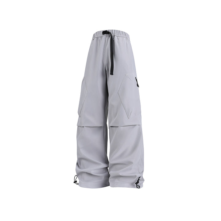 Men's wide cargo pants in baggy style with drawstring waistband, large flap pockets, and adjustable leg openings Drune