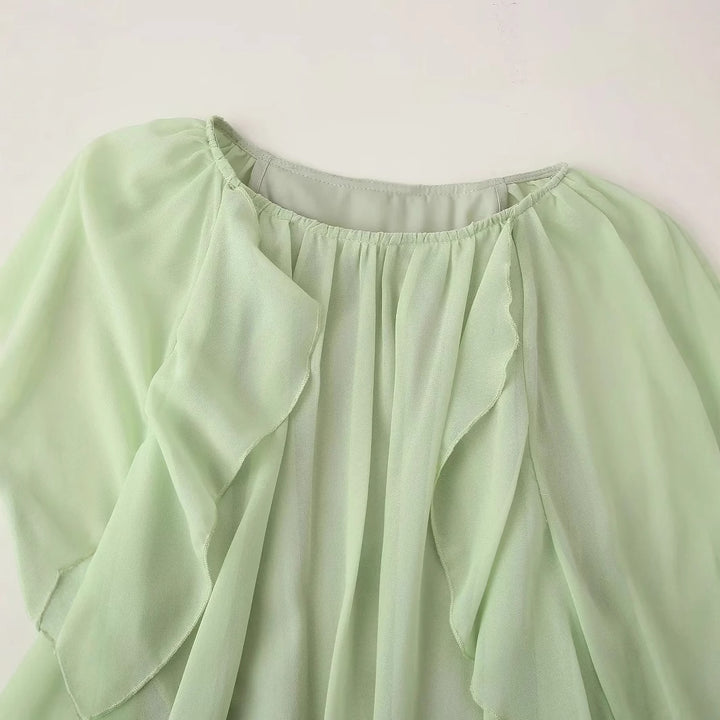 Women's flowing chiffon midi dress with ruffle trim, wide bell sleeves, and gathered round neckline Mune Fashion