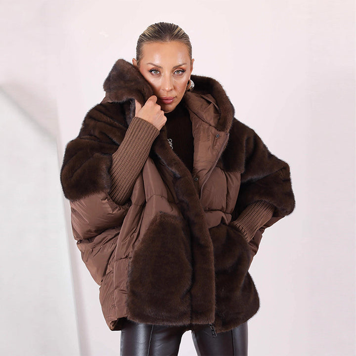 Women's short quilted jacket in cocoon cut with voluminous faux fur trim and hood Mune Fashion