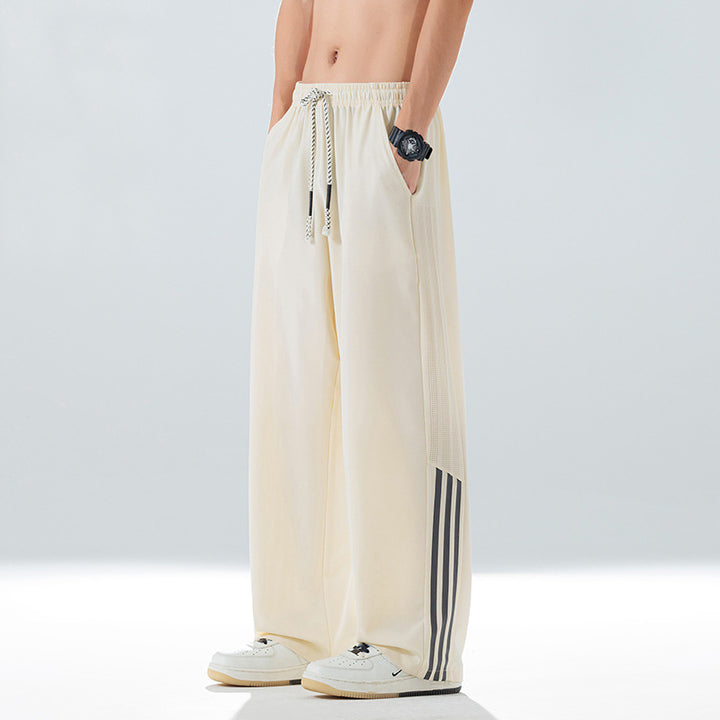 Men's sporty leisure pants with side ventilation openings