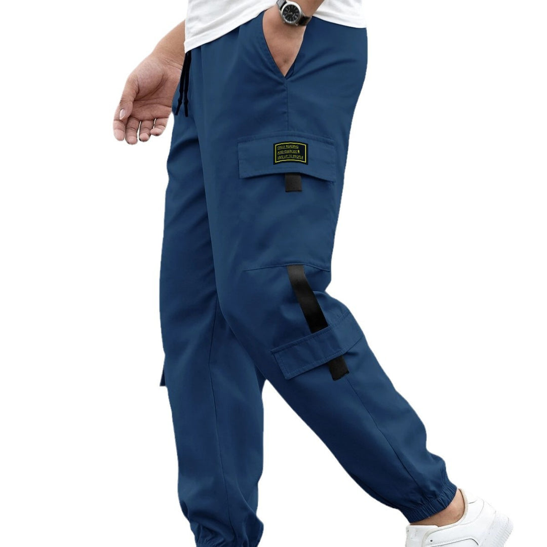 Men's fashionable cargo jogger pants with elastic waistband, drawstring, and multiple security and flap pockets Mune Fashion