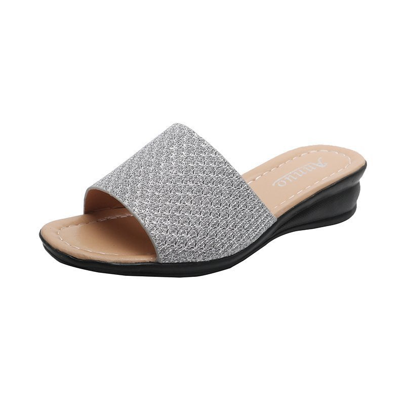 Women's glitter slide sandals with wide strap front, open toe area, cushioned comfort footbed, and lightweight wedge heel Mune Fashion