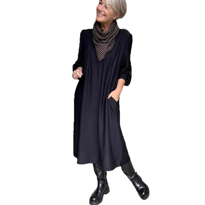 Ladies' loose midi dress with fine pleated look, stand-up collar, short button placket, smocked cuffs, and side pockets Mune Fashion