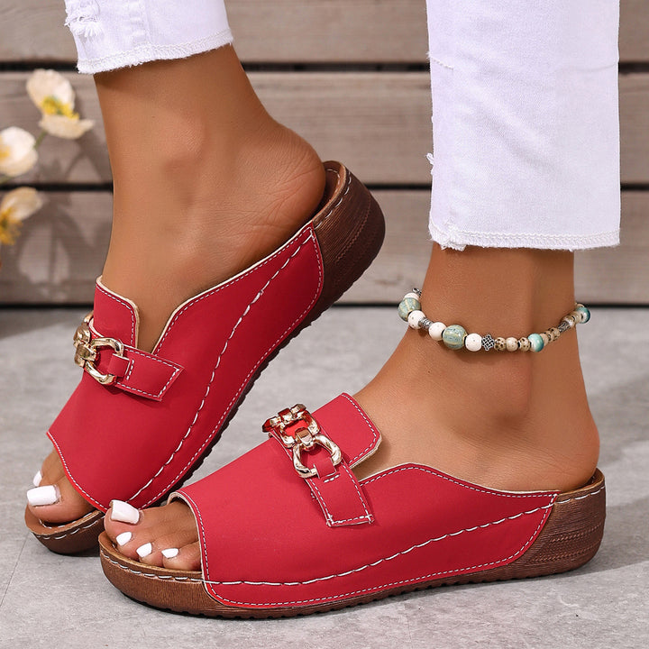 Women's open slide with square toe area, padded comfort footbed and decorative metal chain Mune Fashion