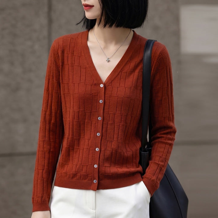 Ladies V-neck fine knit cardigan with structured block design and continuous button placket Mune Fashion