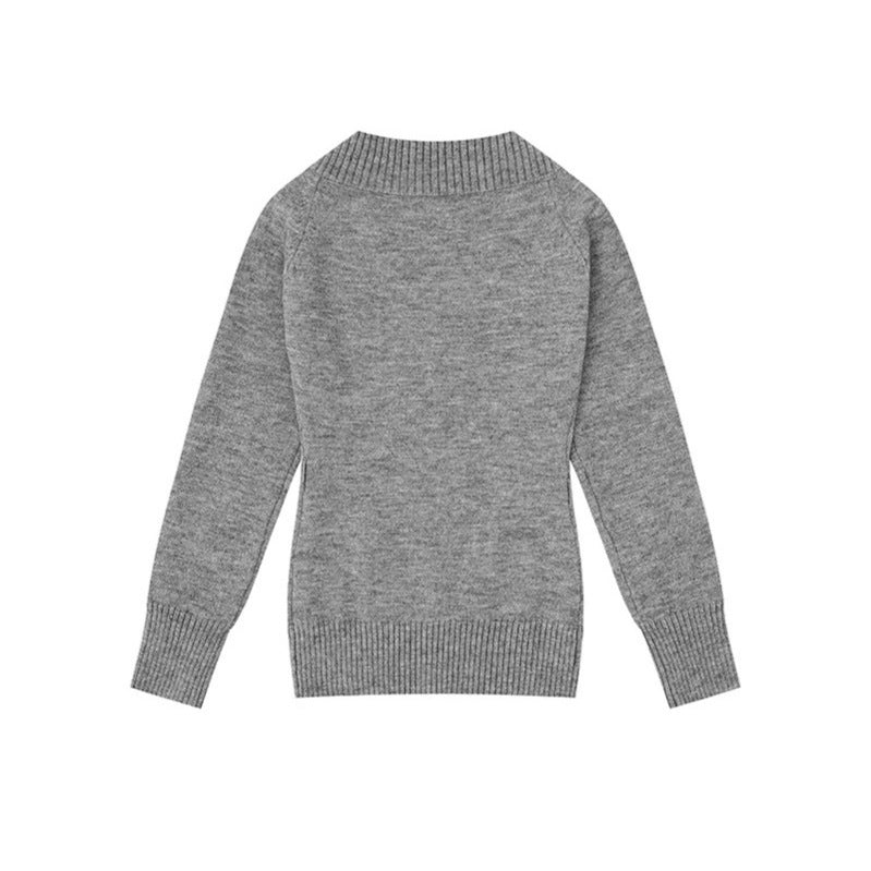 Women's fine knit pullover with deep V-neck, wide ribbed hem, and relaxed fit Mune Fashion