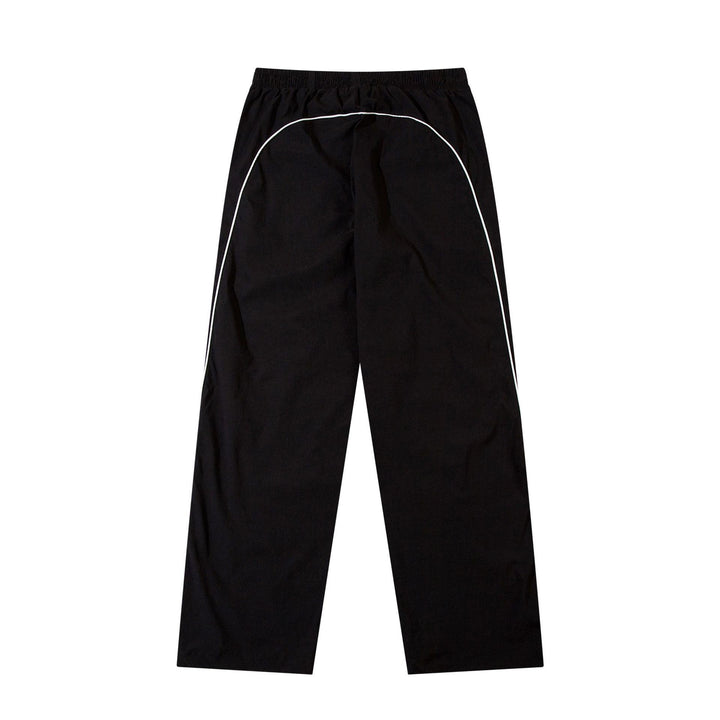 Men's sporty jogging pants with elastic waistband, side contrast piping, and straight cut Mune Fashion