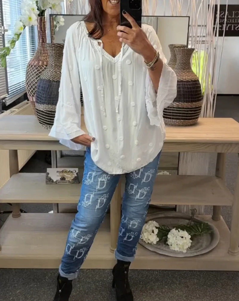 Women's lightweight Boho tunic with V-neck, three-dimensional dot texture and ruffle bell sleeves Mune Fashion