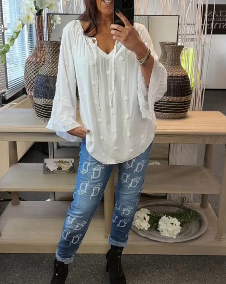 Women's lightweight Boho tunic with V-neck, three-dimensional dot texture and ruffle bell sleeves Mune Fashion