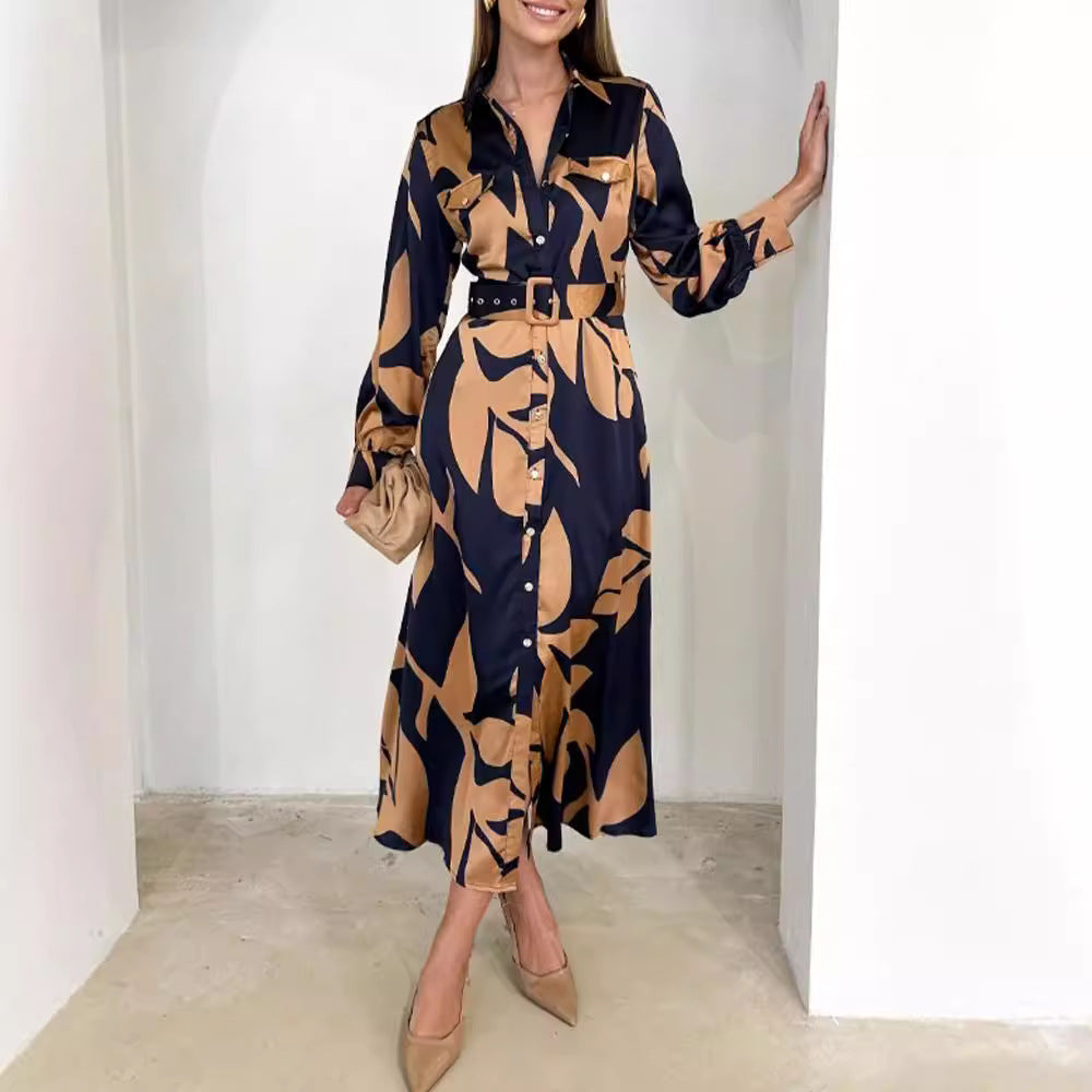 Ladies' elegant satin shirt dress with waist belt, chest pockets, and abstract leaf print Mune Fashion