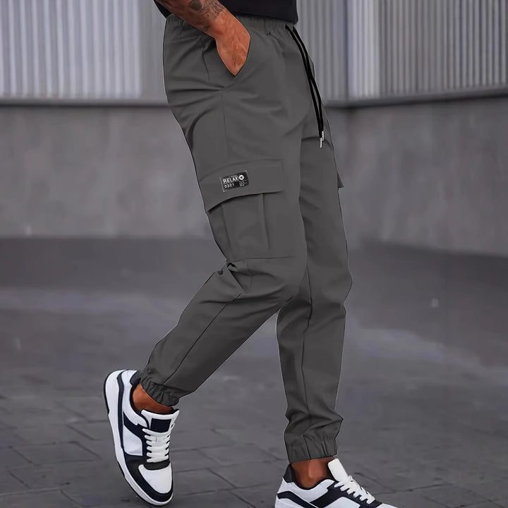 Men's cargo jogging pants with elastic waistband, cargo pockets & drawstring Mune Fashion