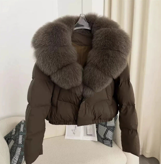 Women's short cut boxy puffer jacket with extra large faux fur collar and shape-stable hem Mune Fashion