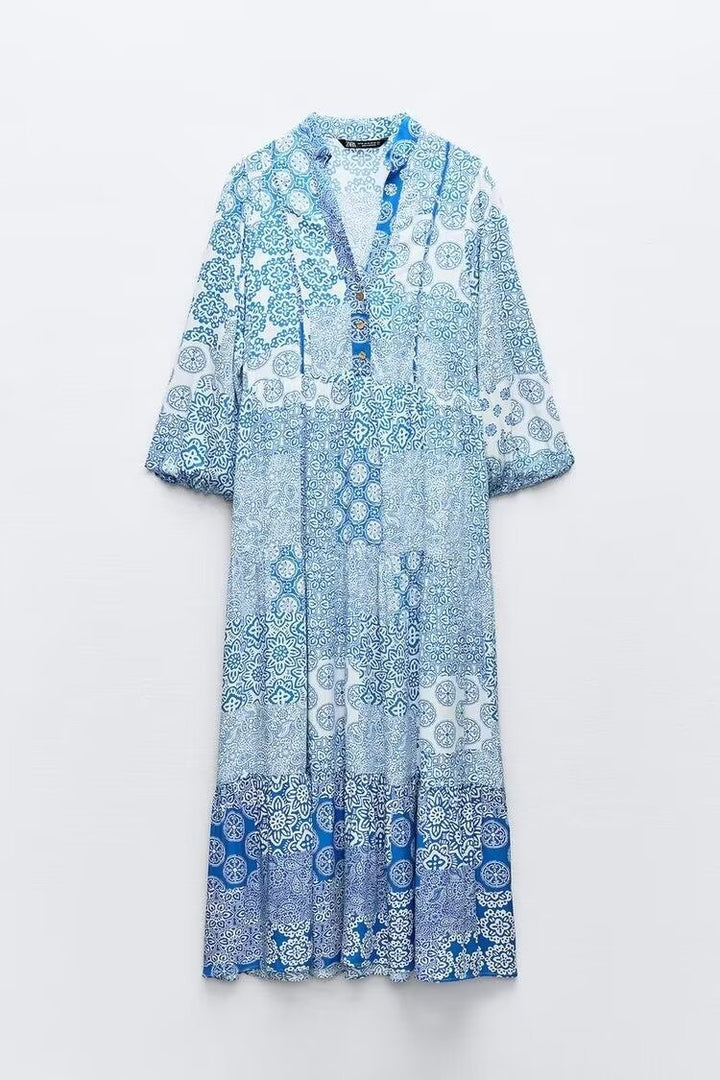 Women's maxi dress in patchwork print with V-neck, tiered skirt, and 3/4 sleeves Mune Fashion