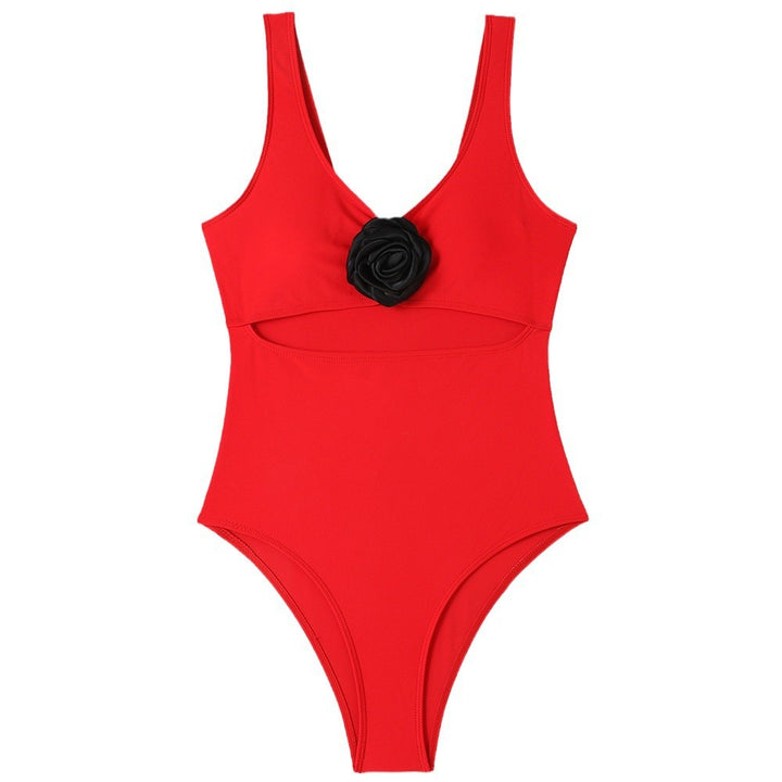 Damen Sportlicher Badeanzug mit stylischem Schnitt und Blumenapplikation Echo Archiv