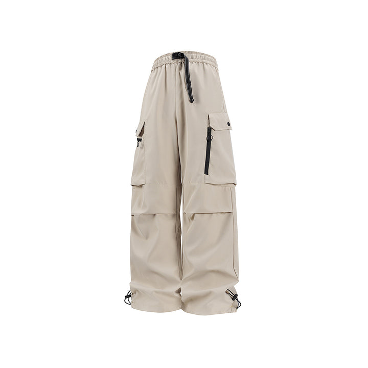 Unisex Wide technical cargo pants with multi-function pockets, drawstring and adjustable leg hems Drune