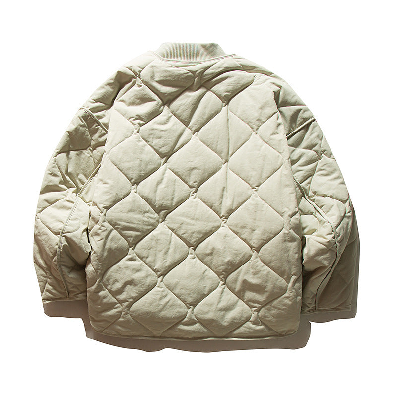 Unisex Lightweight Boxy Puffer Jacket with distinctive diamond quilting, front round pockets, and ribbed collar Mune Fashion