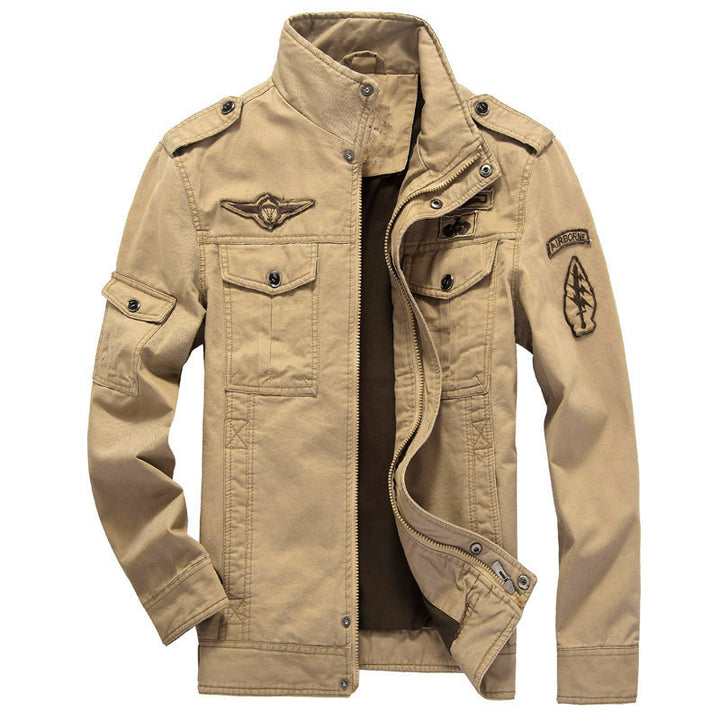 Men's canvas field jacket in pilot style with stand-up collar, utility pockets, and badge applications Mune Fashion