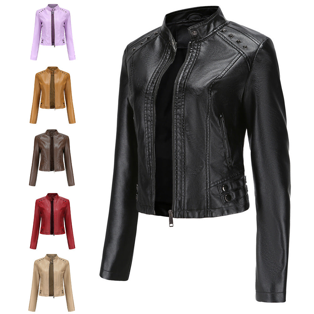 Women's short fitted faux leather jacket with studded detailing and stand-up collar Mune Fashion