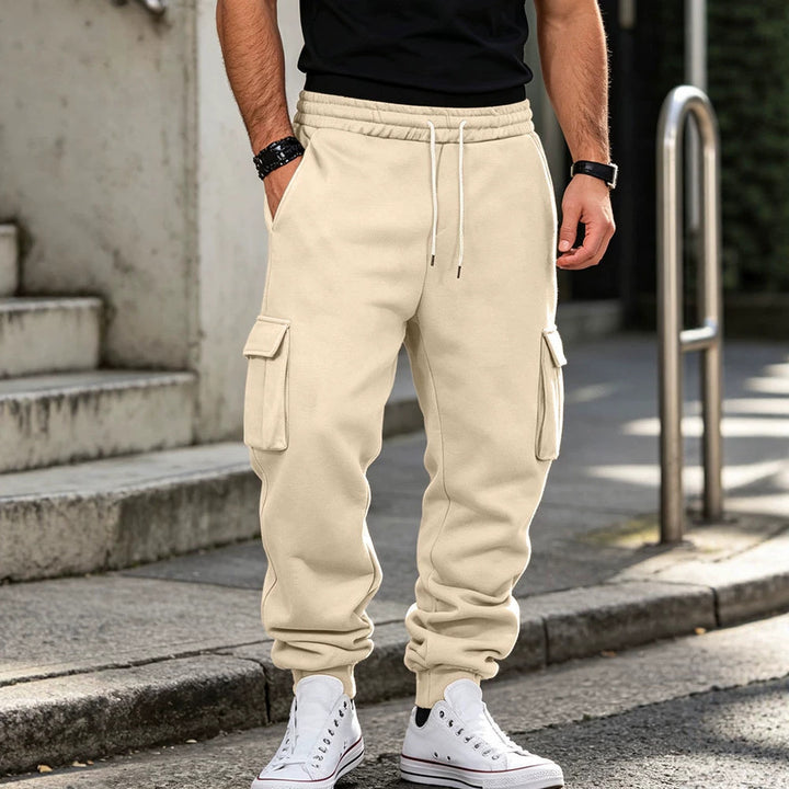 Men's cargo jogging pants made of cotton fleece with elastic waistband and leg cuffs Mune Fashion
