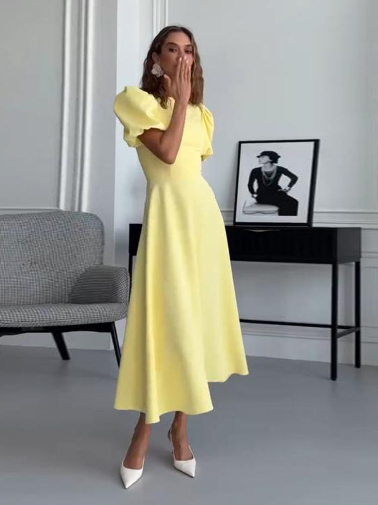 Women’s midi dress with a tailored A-line and voluminous puff sleeves Mune Fashion