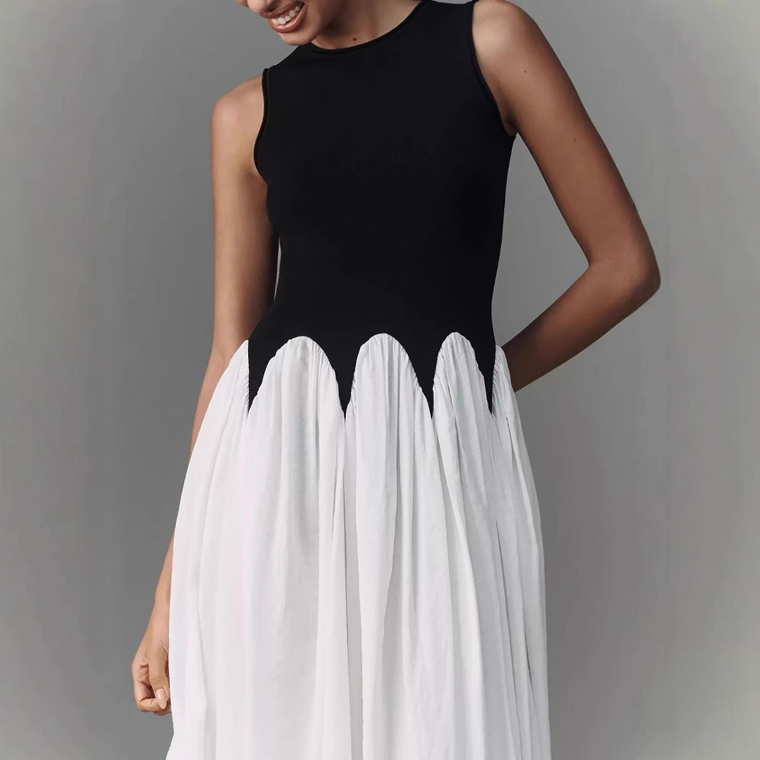 Women’s sleeveless midi dress with fitted ribbed top and flowing tiered skirt Mune Fashion