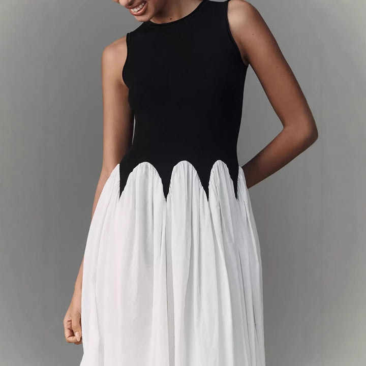 Women’s sleeveless midi dress with fitted ribbed top and flowing tiered skirt Mune Fashion