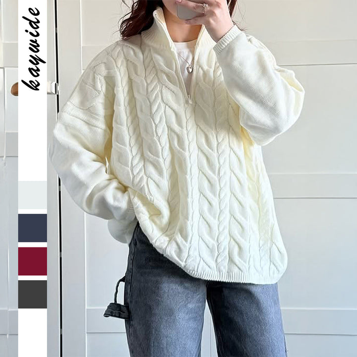 Women's oversized cable knit turtleneck sweater with half zip, high stand-up collar, and rounded hem Mune Fashion