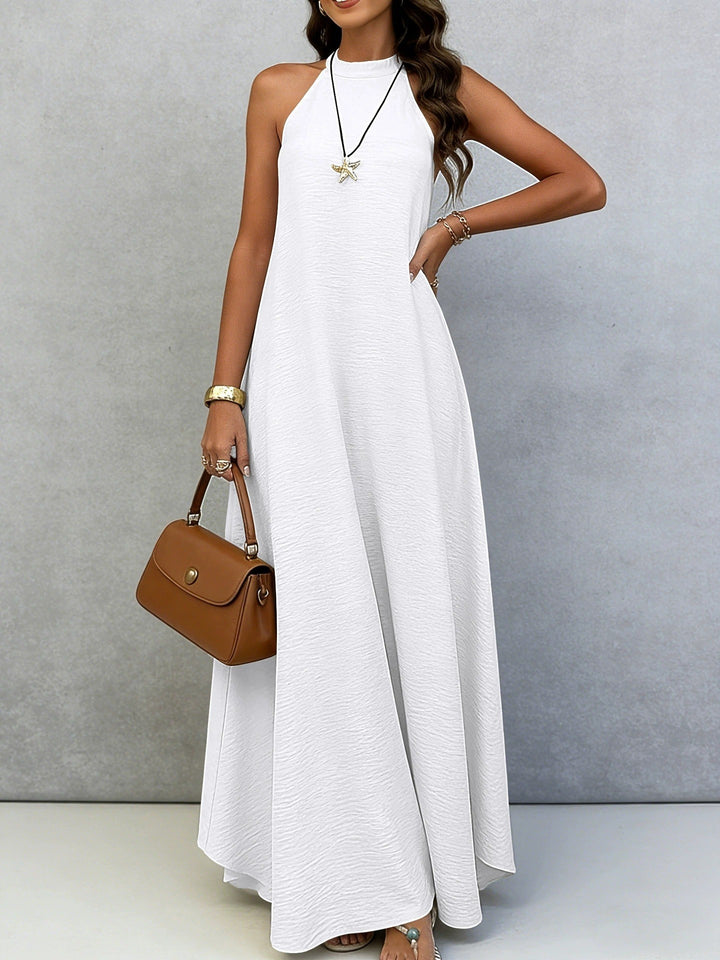 Women’s sleeveless maxi dress with high standing collar, flowing A-line and crepe texture Mune Fashion