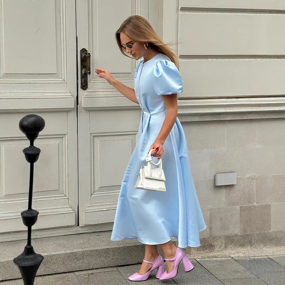 Ladies' midi dress made of satin with voluminous puff sleeves, fitted A-line and continuous button placket Mune Fashion