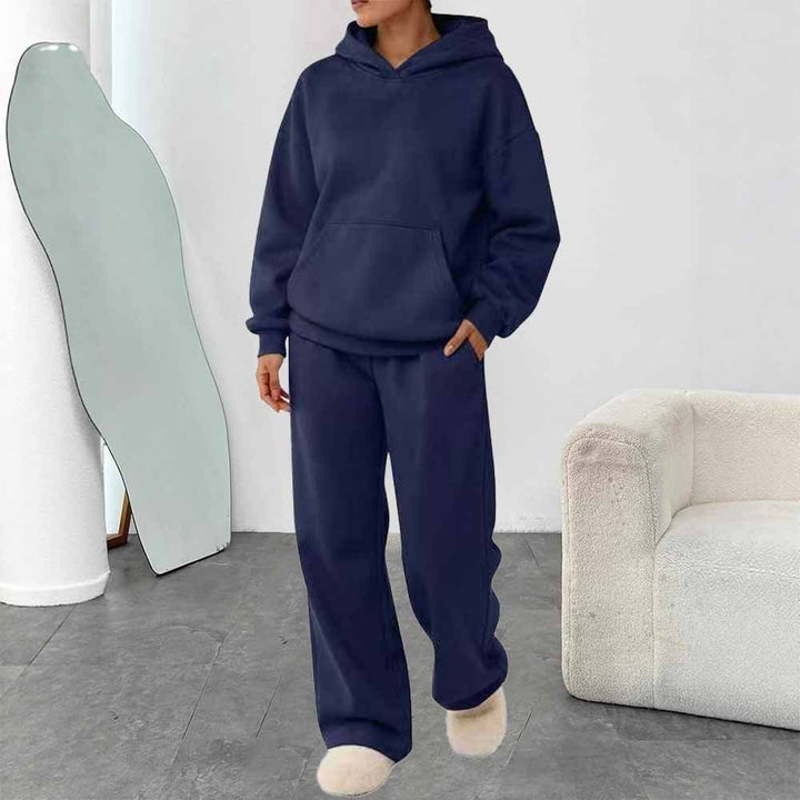 Women's two-piece leisure lounge set with hoodie, kangaroo pocket, and straight lounge pants made of soft cotton blend Mune Fashion