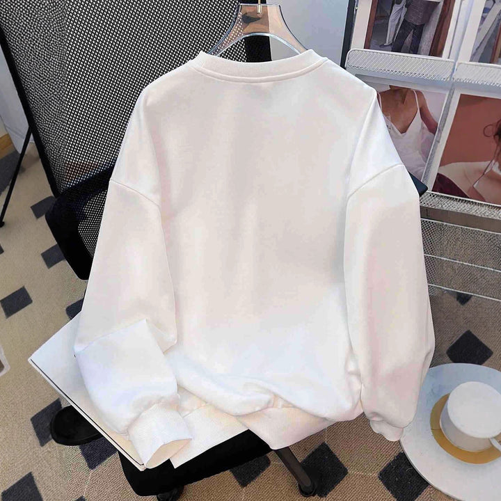 Ladies oversized casual sweatshirt with embroidered star appliqués in denim look and ribbed hem Mune Fashion