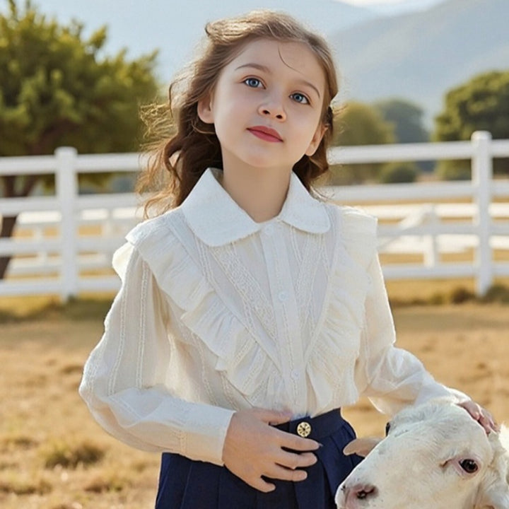 Women’s blouse with ruffle details and fine embroidery Mune Fashion