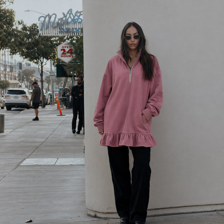 Women's oversized sweat dress with half zipper, balloon sleeves, side pockets, and ruffle hem Mune Fashion