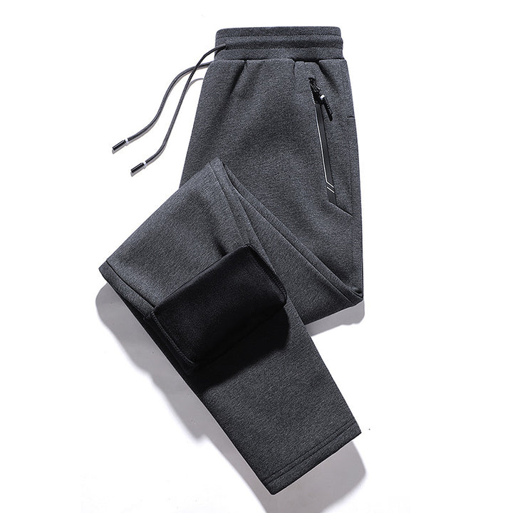 Men's thermo fleece jogging pants with brushed inner side, reflective zipper pockets and drawstring waistband Mune Fashion