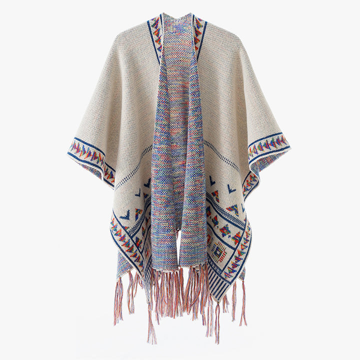 Women's chunky knit poncho with woven ethnic trim and fringes Mune Fashion