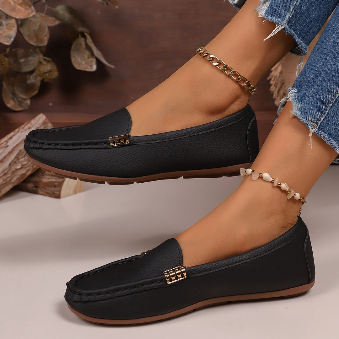 Women's slim moccasin slippers with hand-stitched front seam, padded comfort footbed, and flexible non-slip rubber sole Mune Fashion