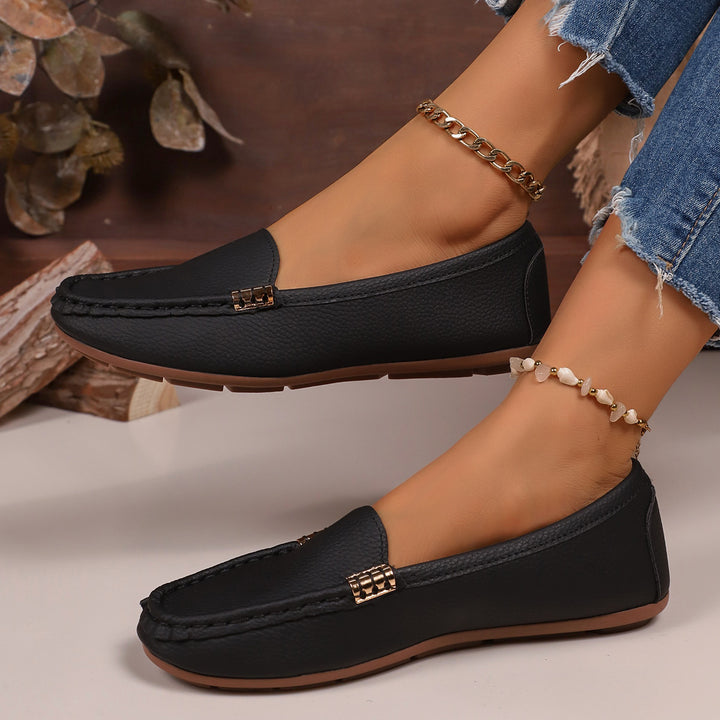 Women's slim moccasin slippers with hand-stitched front seam, padded comfort footbed, and flexible non-slip rubber sole Mune Fashion