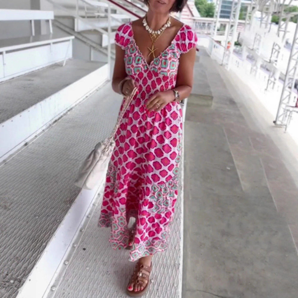 Women’s summer tiered dress with smocked top, V-neckline and puff sleeves Mune Fashion