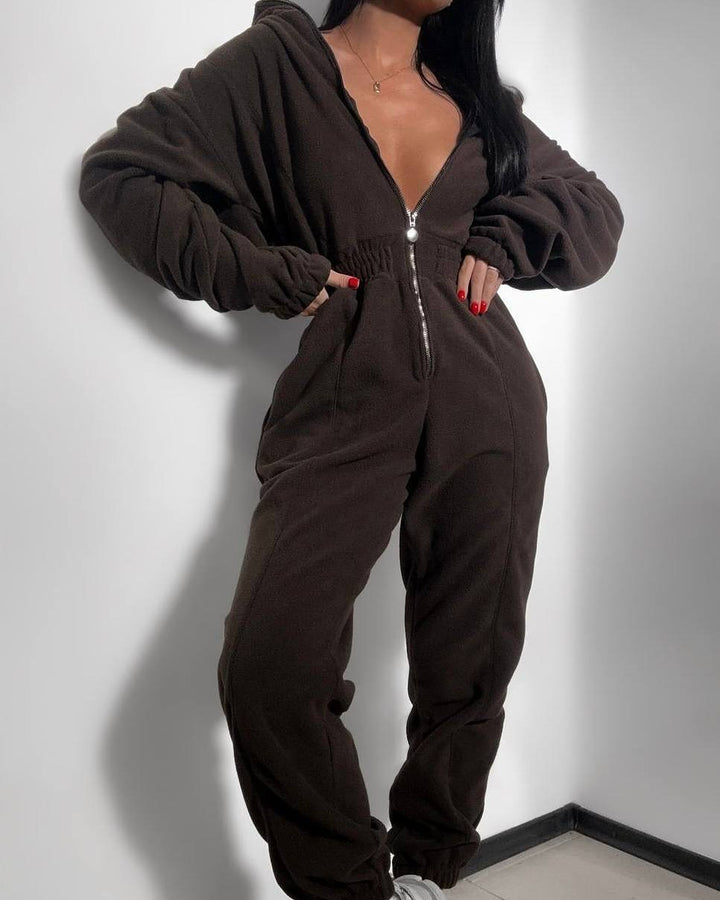 Women's hooded jumpsuit with fitted drawstring, full-length zipper and cuffs