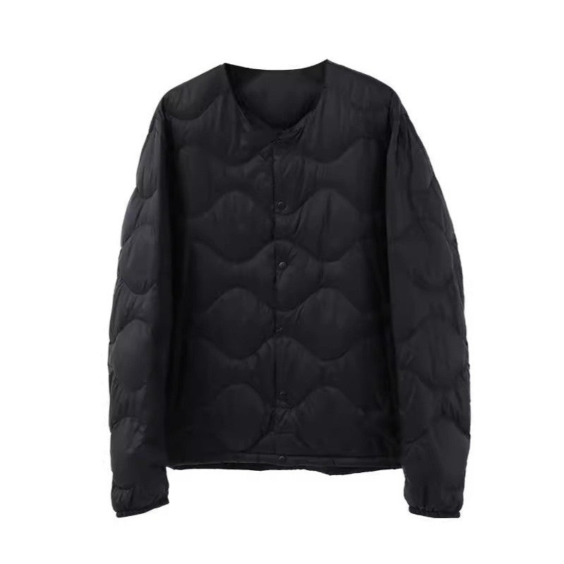 Women’s sleeveless thermal quilted vest with wave-shaped quilting and snap button closure Mune Fashion