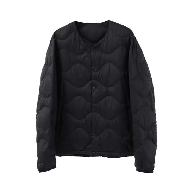 Women’s sleeveless thermal quilted vest with wave-shaped quilting and snap button closure Mune Fashion
