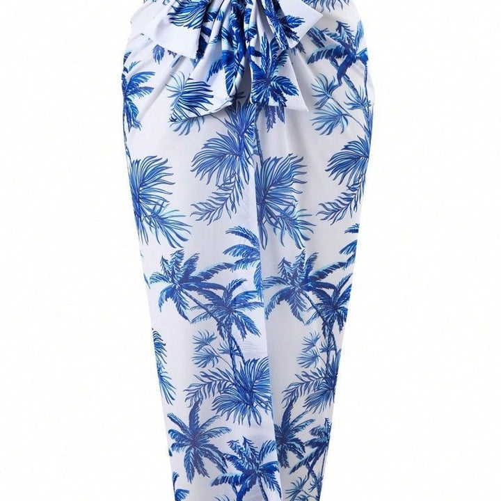 Women's jumpsuit with floral palm print and elegant overlay Mune Fashion