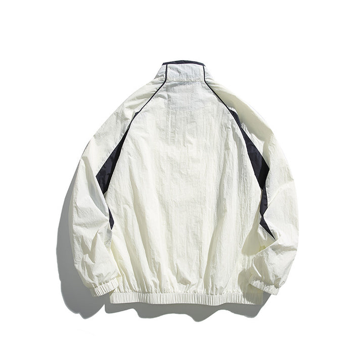 Unisex Lightweight Boxy Hooded Jacket in Windbreaker Style with Contrast Panels and Raglan Sleeves Mune Fashion